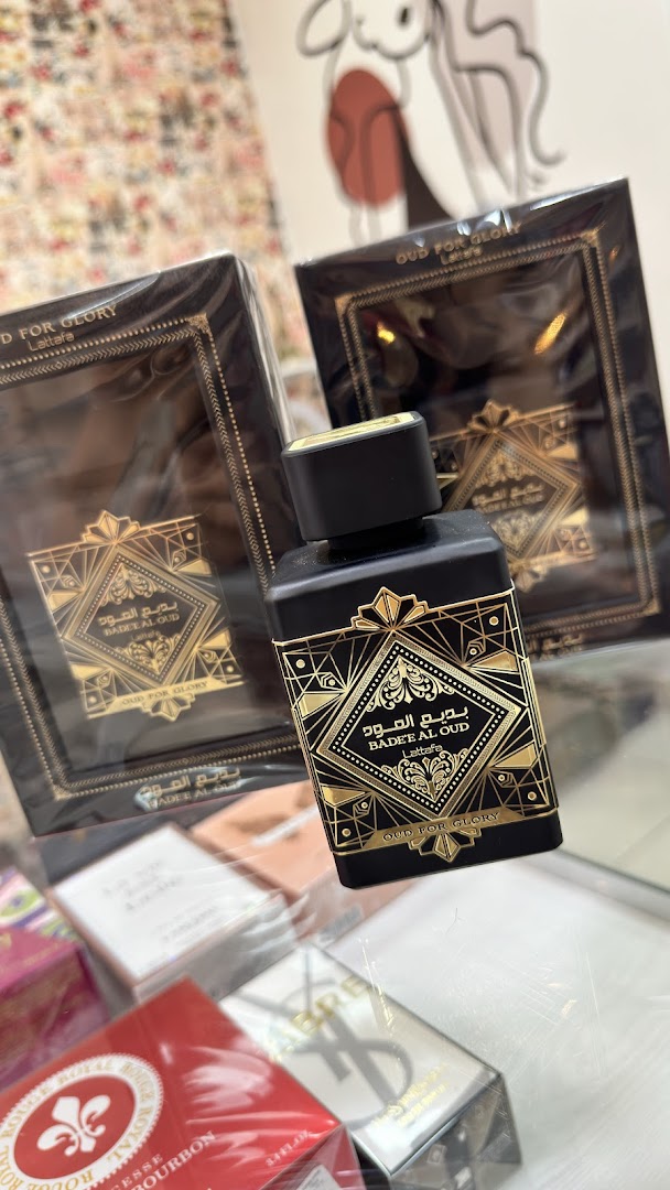Perfume importado preto e dourado