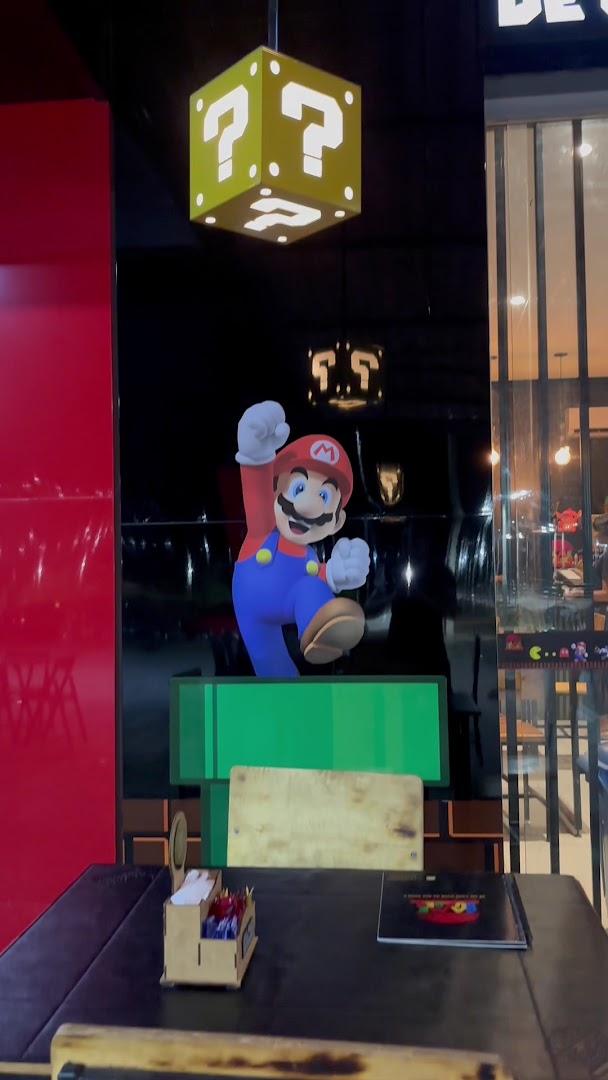 Ambiente gamer do Game Burger com Mario