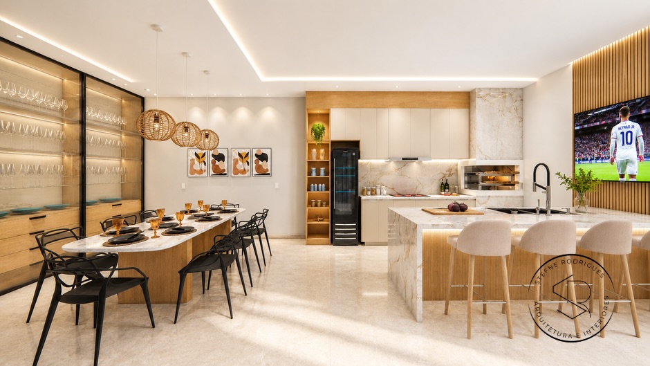 Projeto de cozinha com ilha de mármore e mesa de jantar integrada